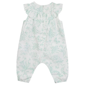Tartine et Chocolat Baby Girls' Sleeveless Jumpsuit with a white and light green botanical print, ruffled collar, and elasticized ankles is displayed flat against a plain background.