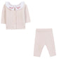 The Tartine et Chocolat Baby Girls' Ruffle Collar Long Sleeved Outfit features pale pink wool and cashmere, a buttoned cardigan with a white ruffled collar and floral embroidery, plus matching pants.