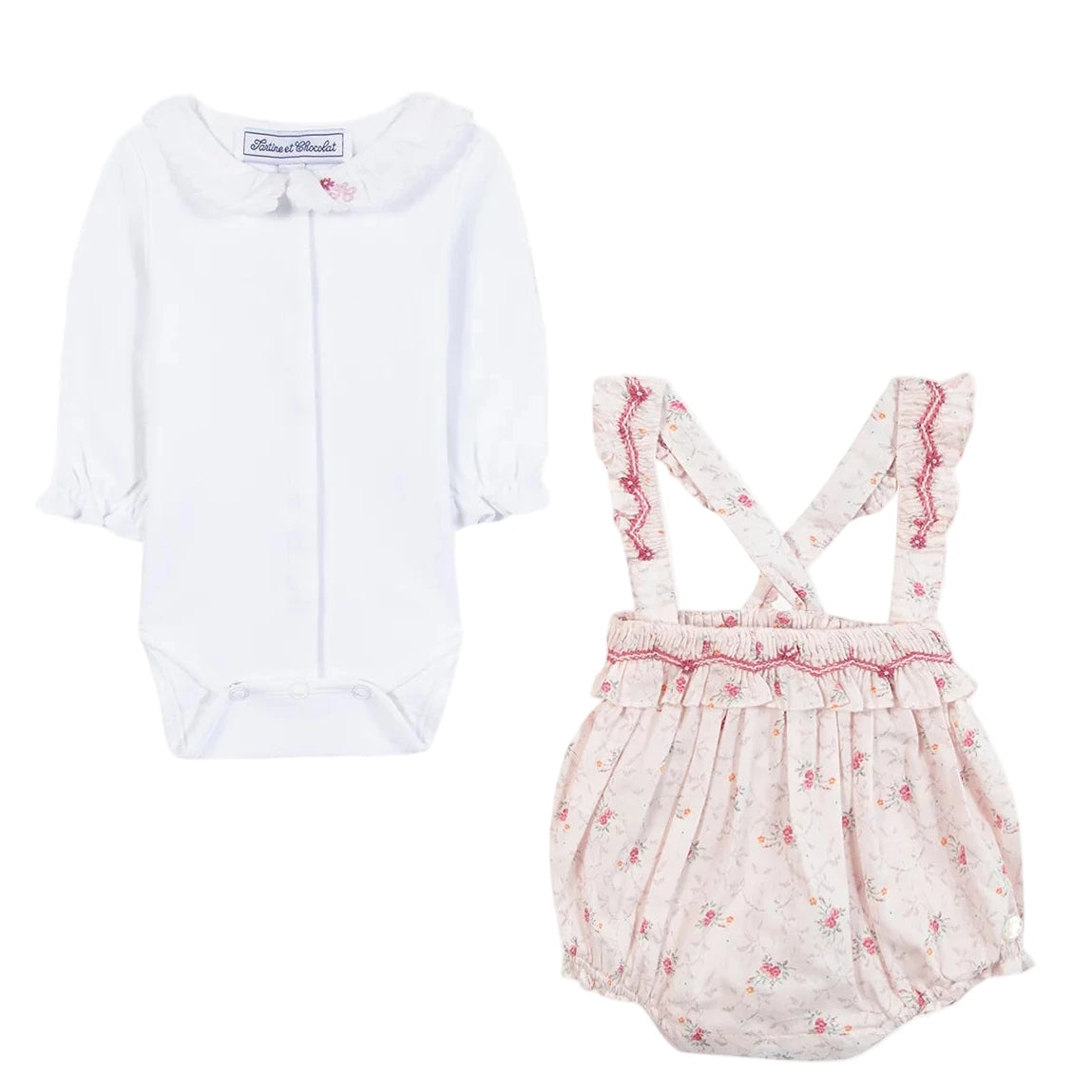 The Tartine et Chocolat Baby Girls' Overall Outfit features a white ruffled collar bodysuit paired with a pink floral romper with suspenders and ruffle trim, creating a charming look for newborn girls.