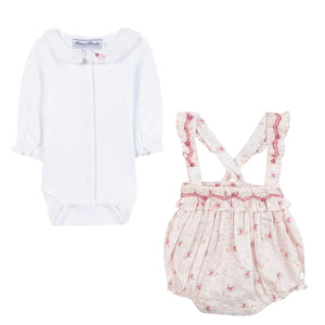 The Tartine et Chocolat Baby Girls' Overall Outfit features a white ruffled collar bodysuit paired with a pink floral romper with suspenders and ruffle trim, creating a charming look for newborn girls.