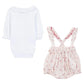 The Tartine et Chocolat Baby Girls' Overall Outfit features a white ruffled collar long sleeve bodysuit and pink floral print suspender bloomers with ruffle trim—an adorable ensemble for newborn girls.
