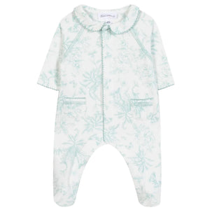 Tartine et Chocolat Baby Girls' Printed Pajamas feature long sleeves, a scalloped collar, two front pockets, and a light green Toile de Jouy-inspired botanical print on soft white fabric.