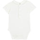 The Tartine et Chocolat Baby Boys’ Pointed Collar Onesie, a white short-sleeved bodysuit with an embroidered collar and three front buttons, is displayed laid flat on a white background.