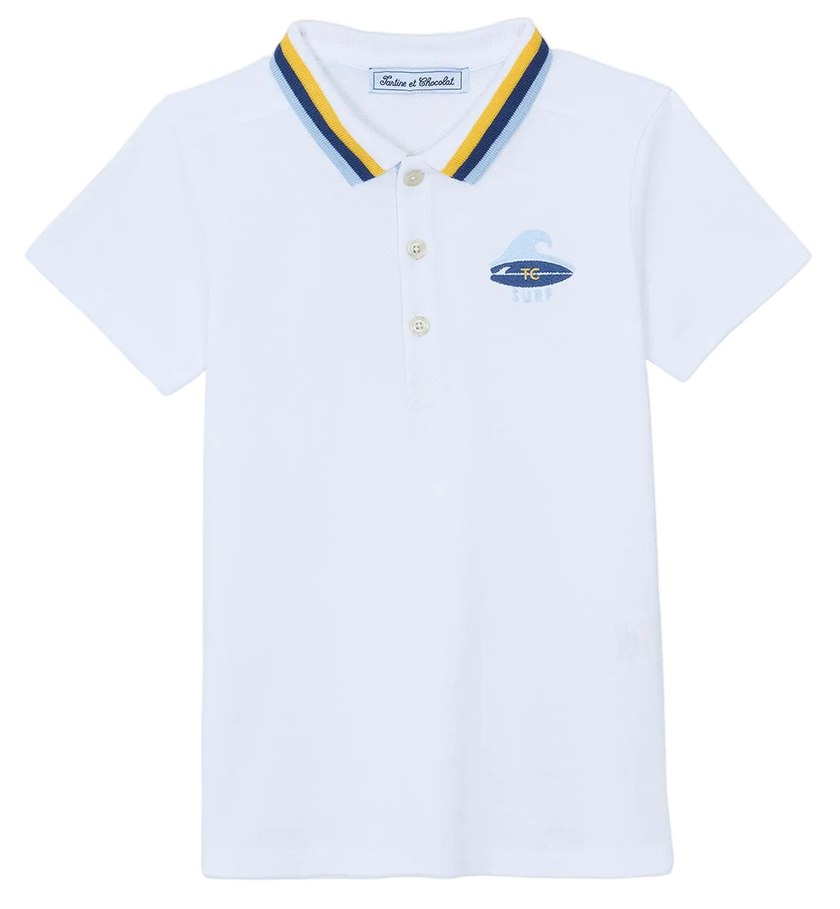 The Boys’ Surfer Polo Shirt by Tartine et Chocolat is a white polo featuring a blue and yellow striped collar and a small embroidered surfboard graphic on the left chest.