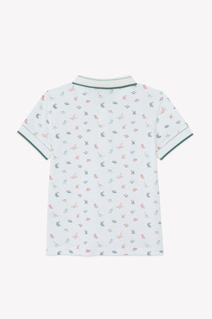 Back view of the Tartine et Chocolat Boys’ Polo Shirt in white, crafted from soft cotton with small animal prints and green trim on the collar and sleeves.