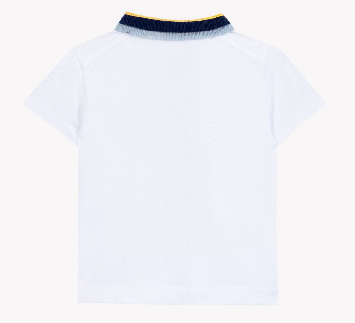 The Tartine et Chocolat Baby Boys’ and Boys’ Polo Shirt is shown from the back in white cotton, featuring a ribbed collar with navy blue and yellow striped trim.