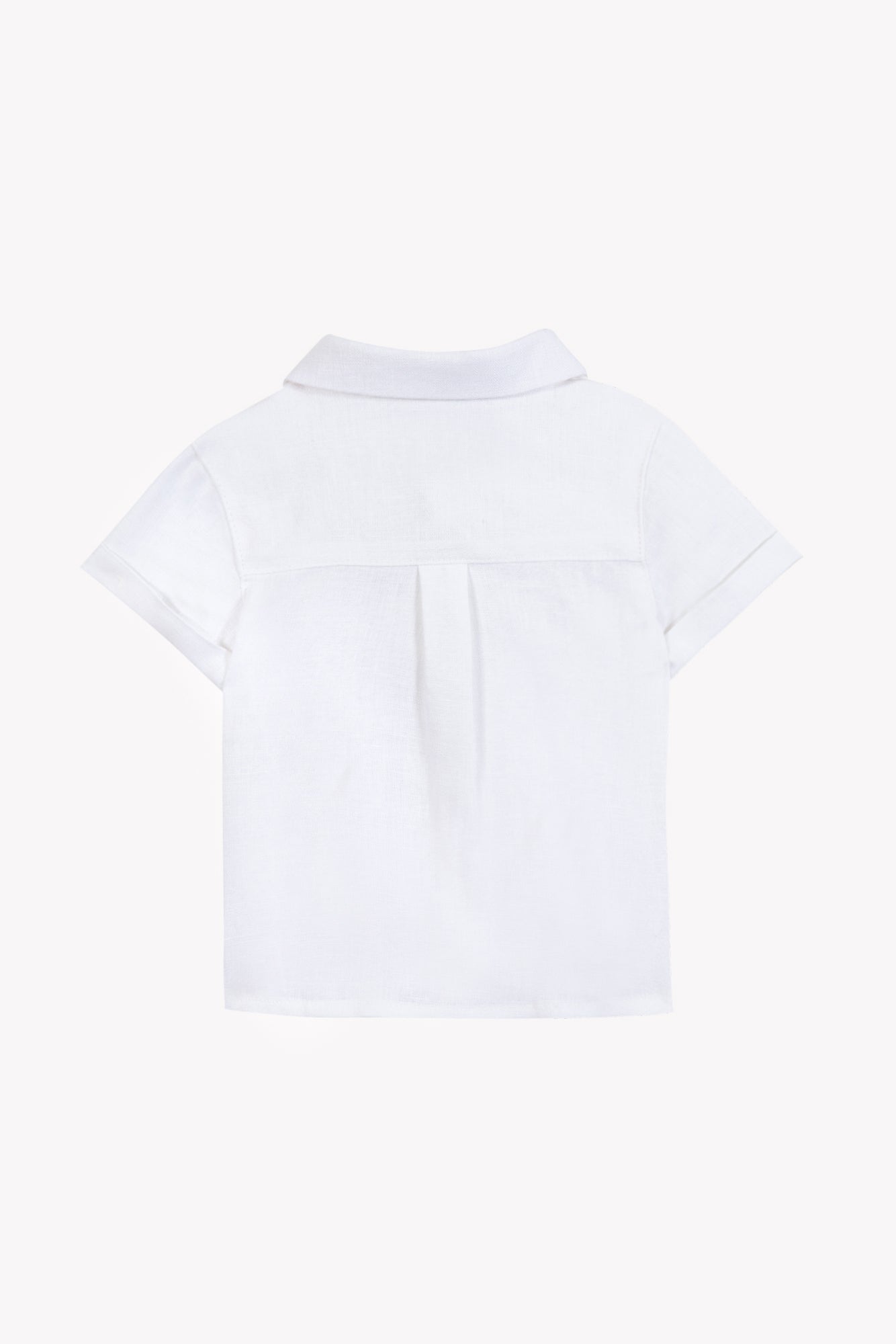 Back view of the Tartine et Chocolat Baby Boys’ and Boys’ Linen Collared Shirt in white, showcasing short sleeves, a yoke, and pleat detail—ideal for special occasions and displayed against a plain white background.