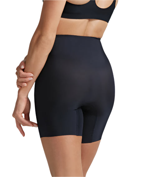 A woman is shown from the back against a white background wearing Commando's Zone Smoothing Shorts in black, paired with a matching bra.