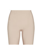 Commando Zone Smoothing Shorts in beige, shown from waist to mid-thigh against a white background, highlighting the front view.