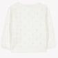 The Tartine et Chocolat Baby Girls’ and Girls’ Openwork Cardigan features a subtle repeating openwork pattern, long sleeves, and scalloped detailing along the neckline. Displayed flat against a plain background, this piece is perfect for layering and adds a delicate texture to any outfit.