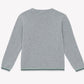 The Boys’ Illustration Sweater by Tartine et Chocolat is shown from the back in light gray, crafted from 100% cotton with ribbed cuffs, neckline, and hem accented by subtle green stripe detailing.