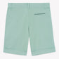 Light green Boys’ Cotton Short by Tartine et Chocolat, displayed from the back, features belt loops, a single horizontal-slit back pocket, and turned-up hems. Crafted from breathable fabric, these shorts are perfect for active play.