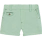 Tartine et Chocolat Baby Boys’ and Boys’ Shorts in light green cotton feature practical belt loops, a buttoned left pocket, two handy side pockets, and rolled cuffs—an ideal choice for adventurous young seaside explorers.