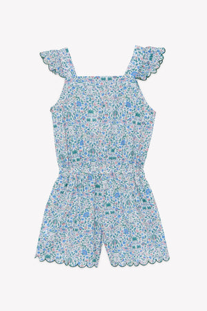 The Girls’ Liberty Print Short Jumpsuit by Tartine et Chocolat features scalloped edges at the shoulders and shorts, with a delicate small floral print in blue, green, and pink on a white background.
