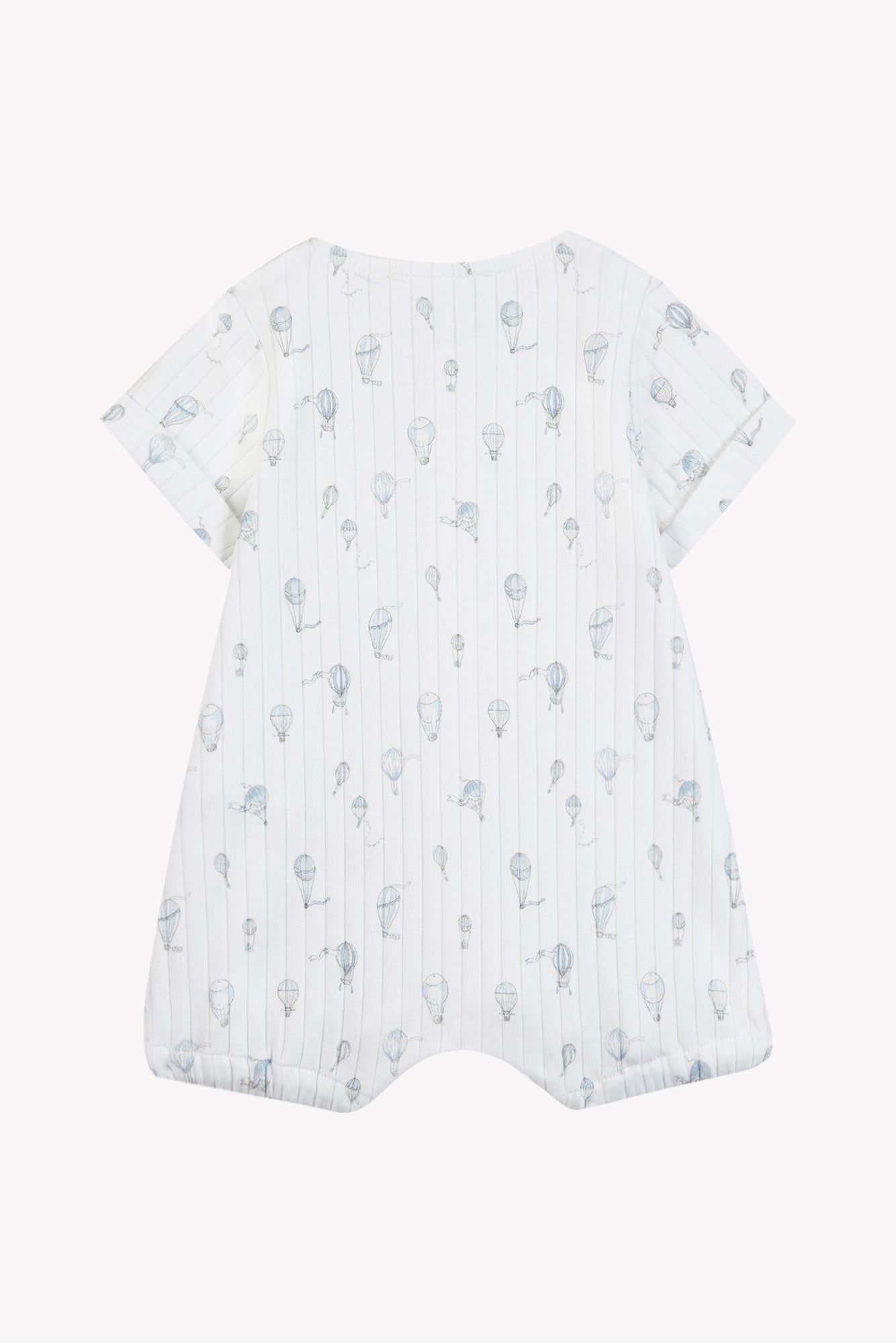 The Tartine et Chocolat Baby Boys’ Hot Air Balloon Short Jumpsuit is a white, short-sleeve cotton romper featuring thin vertical stripes and small blue hot air balloon illustrations, shown laid flat with a back view.