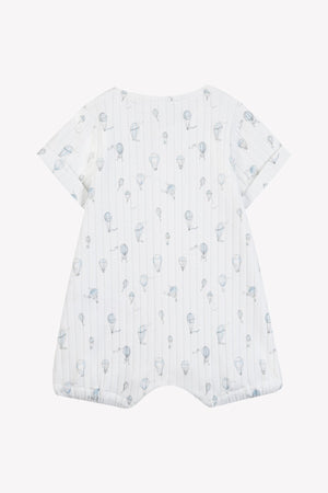 The Tartine et Chocolat Baby Boys’ Hot Air Balloon Short Jumpsuit is a white, short-sleeve cotton romper featuring thin vertical stripes and small blue hot air balloon illustrations, shown laid flat with a back view.