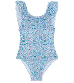 Tartine et Chocolat Girls’ Liberty Fabric Print Swimsuit, showcasing a charming blue, pink, and green floral pattern with ruffled shoulder straps and a scoop neckline—an adorable addition to any girl’s swimwear collection. Displayed on a white background.