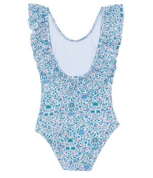 The Girls’ Liberty Fabric Print Swimsuit by Tartine et Chocolat showcases a charming floral pattern with blue, green, and pink flowers on a white background. Designed with ruffled straps and a scoop neckline, this one-piece is crafted from soft Liberty fabric for playful comfort and style.