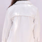 A child with long brown hair is shown from behind, wearing the Tartine et Chocolat Girls’ Cotton Jacket with embroidered pockets and matching pants, set against a plain light background.