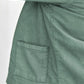 Close-up of the lower side of the Tartine et Chocolat Baby Boys’ and Boys’ Explorer Jacket, highlighting a small rectangular pocket with visible stitching.