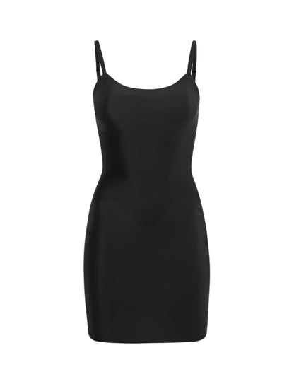 The Commando Zone Smoothing Full Slip is a black, form-fitting dress with thin straps and zoned compression, shown on a plain white background.