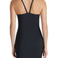 A woman shown from the back wears the Commando Zone Smoothing Full Slip, a fitted black dress with adjustable shoulder straps.