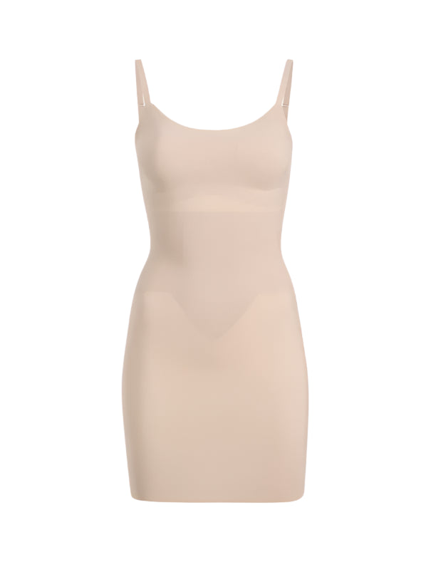 The Commando Zone Smoothing Full Slip is a beige, sleeveless bodycon dress with thin straps and targeted compression for a smooth silhouette, shown against a plain white background.