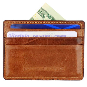 The Smathers & Branson Mixed Signals Card Wallet securely holds a driver’s license, two credit cards, and a folded U.S. dollar bill.