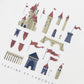 A charming castle graphic featuring towers, arches, and red flags adorns this unbleached cotton T-shirt for baby boys and boys from Tartine et Chocolat, with the brand name printed below.