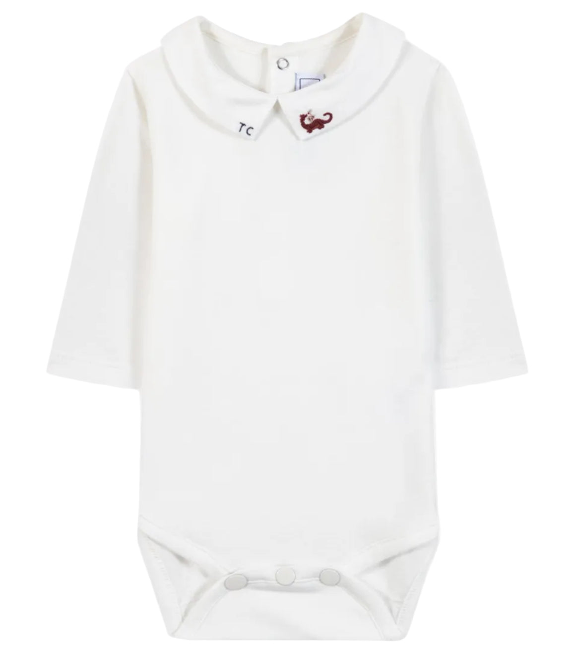 The Tartine et Chocolat Baby Boys’ Dinosaur Bodysuit features a white long-sleeve cotton design with a Peter Pan collar, button closure at the back, and snap buttons at the bottom; an embroidered red dinosaur on the collar adds a playful touch to this adorable baby romper.