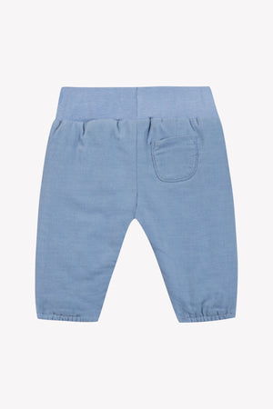Tartine et Chocolat Baby Boys’ Corduroy Trousers in light blue, crafted from 100% cotton with an elastic waistband and cuffs, and a small patch pocket on the back, are displayed on a white background.