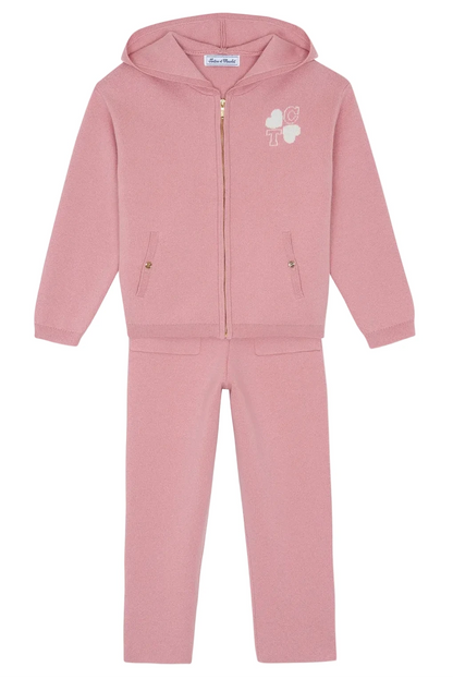 Tartine et Chocolat Girls’ Wool Hood Cotton Jogging Suit in pink features a hooded zip-up jacket with a gold zipper, subtle white graphic detail, and convenient pockets, paired with matching pants also equipped with pockets.