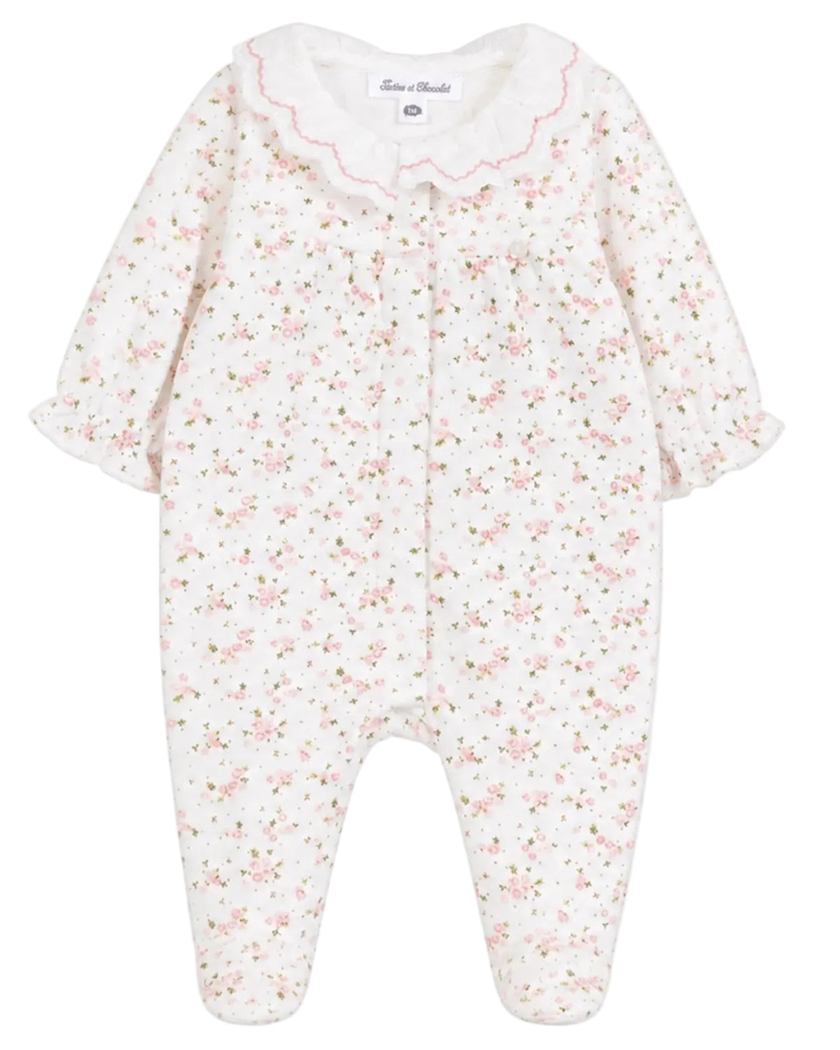 The Tartine et Chocolat Baby Girls’ Ruffle Collar Pajama features a charming long-sleeve design with a delicate pink floral pattern, ruffled cuffs, and a scalloped white collar. Made from soft, comfortable unbleached cotton, these pajamas are gentle on delicate skin and perfect for cozy nights.
