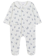 The Tartine et Chocolat Baby Boys’ Ribbed Knit Pajama is a white sleepsuit with long sleeves, covered feet, and a convenient front zipper. Adorned with charming blue teddy bear motifs and crafted from soft unbleached cotton, this pajama set offers newborn boys both comfort and adorable style.