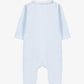 Tartine et Chocolat Baby Boys’ Velvet Pointed Collar Pajamas in light blue, featuring footed legs and a pointed collar, displayed flat on a plain white background.
