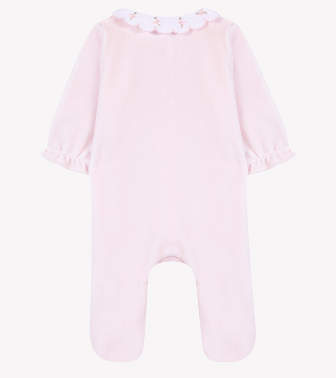 Tartine et Chocolat Baby Girls’ Velvet Peter Pan Collar Pajamas in light pink, featuring long sleeves with ruffled cuffs and an elegant white Peter Pan collar adorned with delicate pink embroidery. Presented flat on a white background, these pajamas offer convenient snap closures for easy changing while ensuring a cozy and refined look.