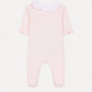 The Tartine et Chocolat Baby Girls’ Peter Pan Collar Gathered Pajamas, made from soft cotton in light pink, feature short ruffled sleeves and a charming white Peter Pan collar, displayed against a white background.