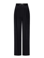 The Cecilia Trouser by Victoria Beckham is a black wide-leg tailored style featuring front pleats, a high waist, belt loops, and a concealed front closure, showcased against a plain white background for a modern aesthetic.