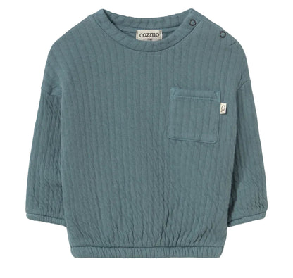 The Cozmo Baby Boys’ Chipre Quilted Sweatshirt is a teal, long-sleeve organic cotton sweatshirt featuring a chest pocket with a small brand label, two shoulder snaps for easy changing, and cozy quilted fabric—ideal for comfy fall and winter baby clothes.