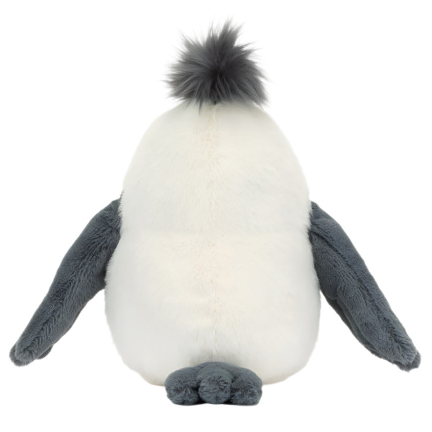 The back view of the Jellycat Chip Seagull plush toy reveals a white body, gray flippers and feet, complemented by a tuft of dark gray fur on top, capturing the charm of a beach bird.