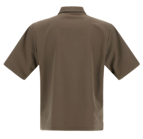 The Herno Seersucker Camp Shirt, a short-sleeved olive green piece with a versatile cut, is displayed from the back against a white background.