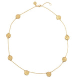 The Butterfly Coin Station Necklace by Anabel Aram features evenly spaced round charms on a delicate, 18k gold dipped chain, shown on a white background.