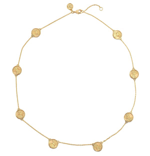 The Butterfly Coin Station Necklace by Anabel Aram features evenly spaced round charms on a delicate, 18k gold dipped chain, shown on a white background.