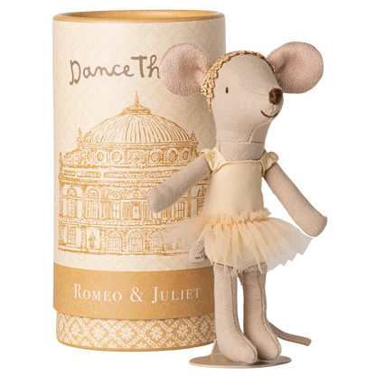 A Maileg Ballet Dancer Mouse, Big Sister, poses gracefully in front of a cylindrical "Dance The Romeo & Juliet" box with a building illustration—ideal for display.