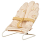The Maileg Babysitter, Micro - Off White is a small fabric-covered baby bouncer with a floral pattern, yellow harness, and white metal frame, ideal for micro-sized rabbits or bunnies. Shown against a white background.