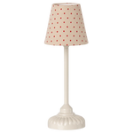 The Maileg Vintage Floor Lamp, Mouse - Sand features a white, round, ridged base and a red polka dot fabric shade—perfect for adding soft light to any space.