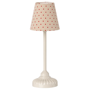 The Maileg Vintage Floor Lamp, Mouse - Sand features a white, round, ridged base and a red polka dot fabric shade—perfect for adding soft light to any space.
