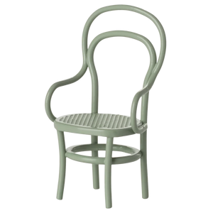 The Maileg Vintage Chair, Mouse - Mint is a light green wooden chair with curved backrest, arms, woven seat, and circular support ring—ideal for mice furniture or as a charming dollhouse accessory.