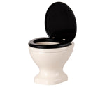 Off White Water Closet - Mouse by Maileg, featuring a white porcelain toilet with a black seat and raised lid, photographed against a plain white background—an on-trend bathroom accessory perfect for bringing style to any small space.
