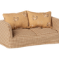 The Maileg Couch, Mouse - Mable is a small patterned sofa with two floral cushions and beige-brown checkered fabric—ideal for a cozy mice family home.